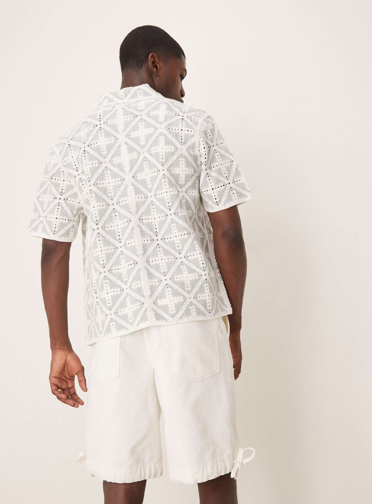 ASOS DESIGN longer length shorts with pleat detailing in ecru