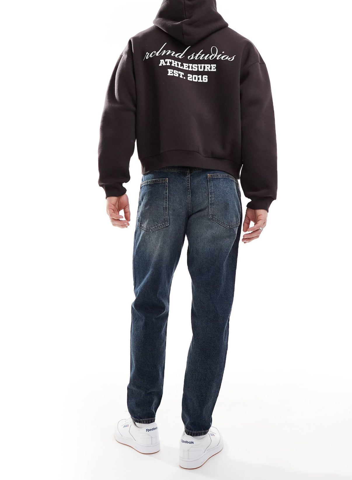 ASOS DESIGN tapered jeans with vintage tint in dark wash blue