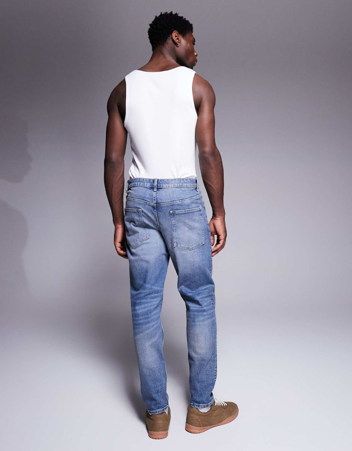 ASOS DESIGN tapered jeans in vintage light wash blue
