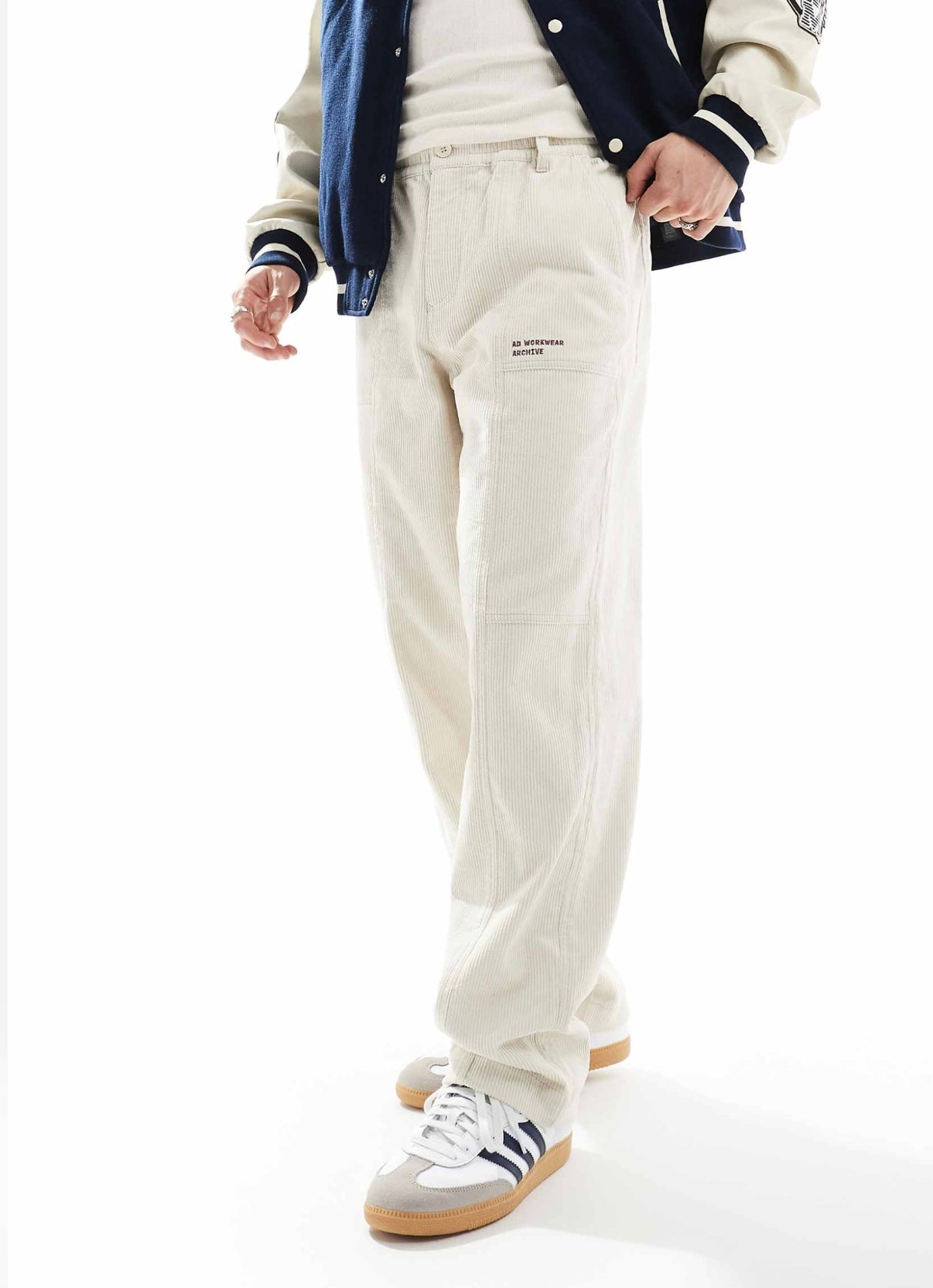 ASOS DESIGN baggy cord trousers with embroidered patch in stone