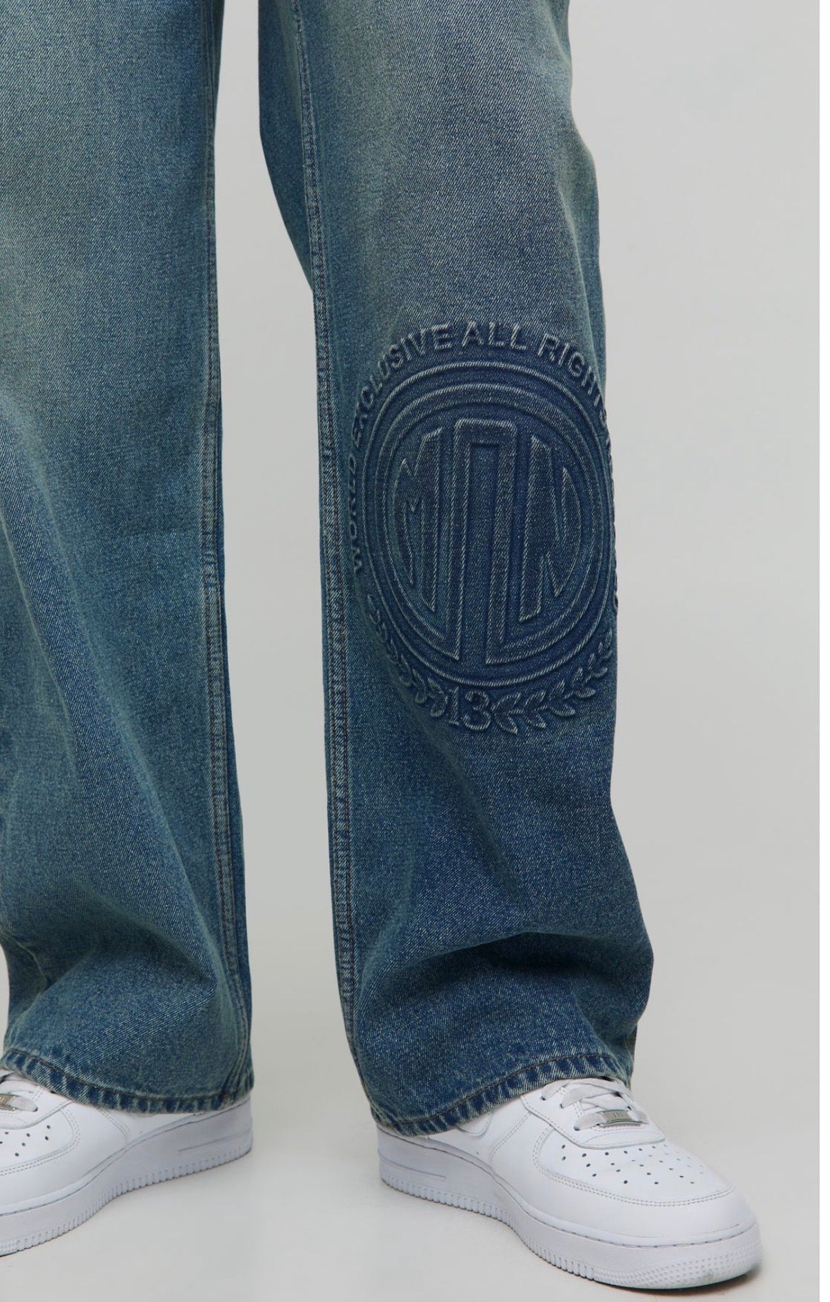 BoohooMAN Tall Relaxed Fit Embossed Jeans