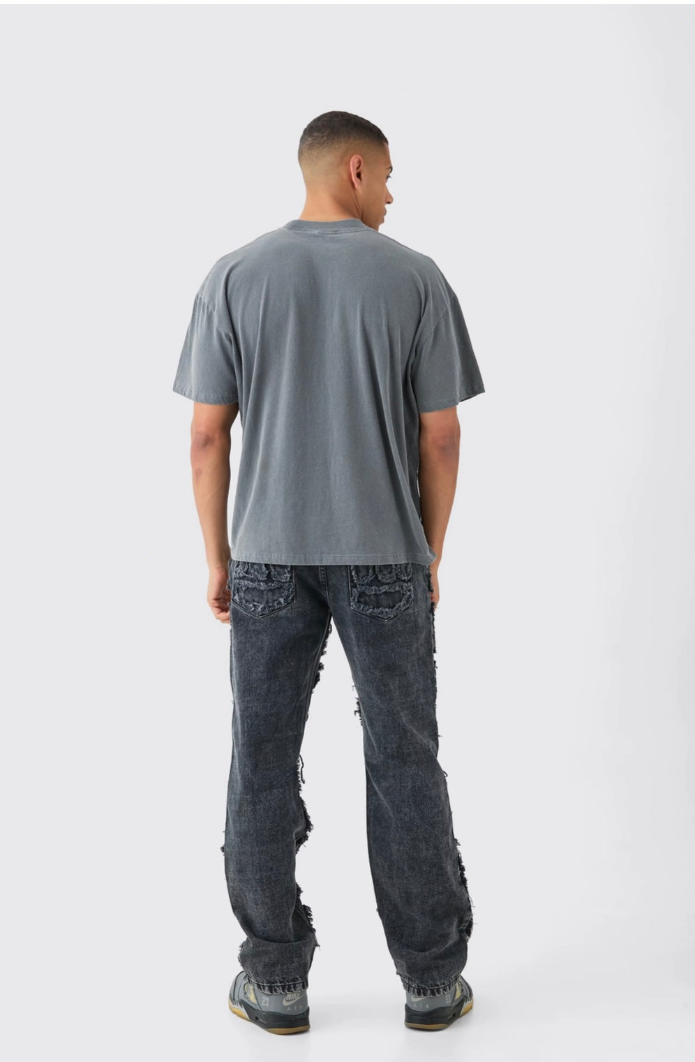 BOOHOOMAN RELAXED RIGID DISTRESSED PATCHWORK JEANS IN WASHED BLACK