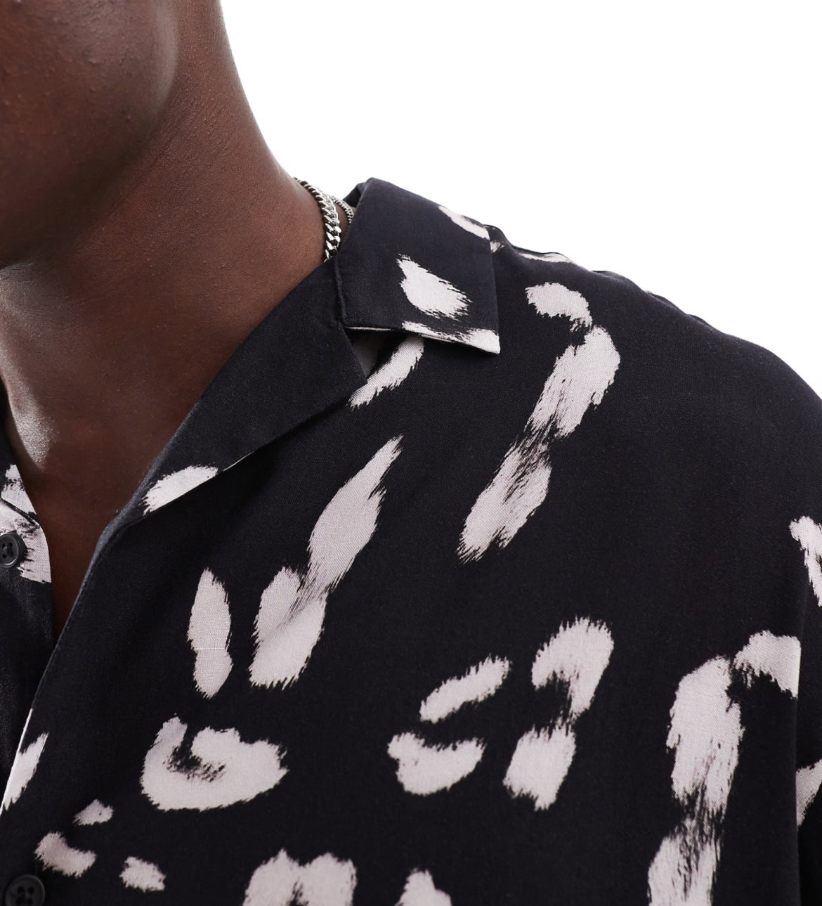 ASOS DESIGN oversized revere shirt with leopard print in black