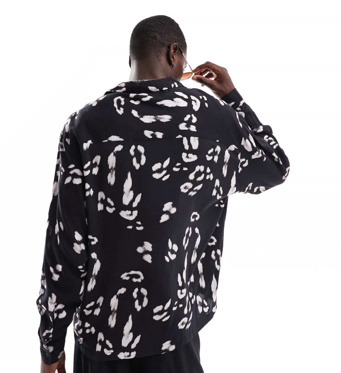 ASOS DESIGN oversized revere shirt with leopard print in black