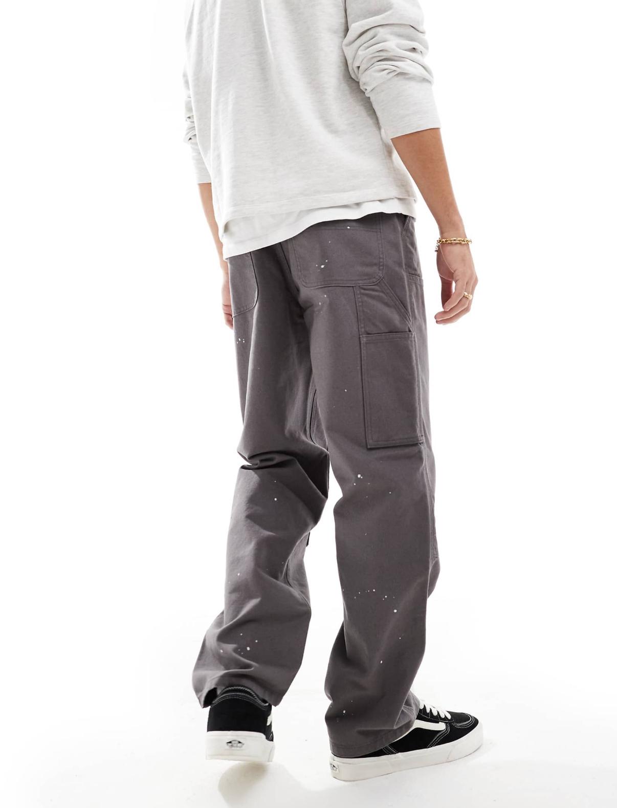 ASOS DESIGN carpenter trousers with paint splats in charcoal