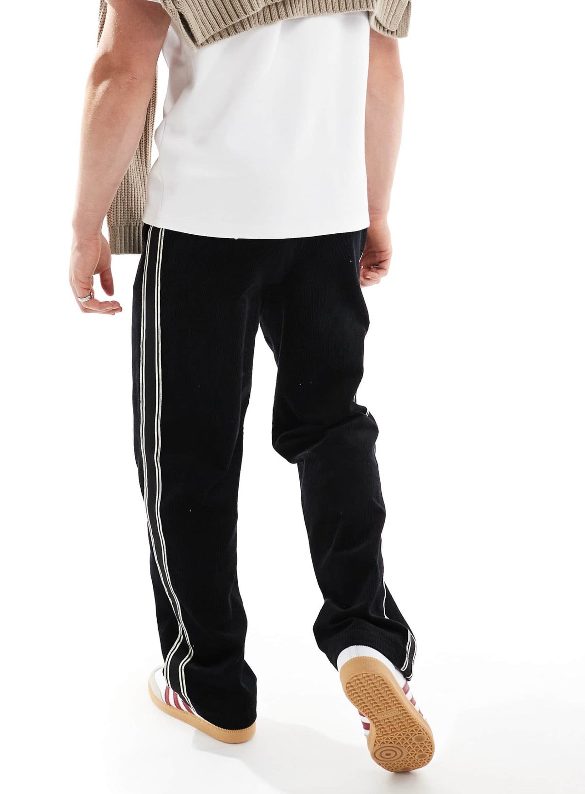 ASOS DESIGN baggy cord trousers with side taping in black