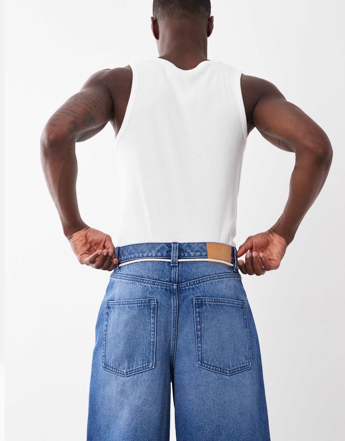 ASOS DESIGN loose denim jorts in mid wash blue with self tie