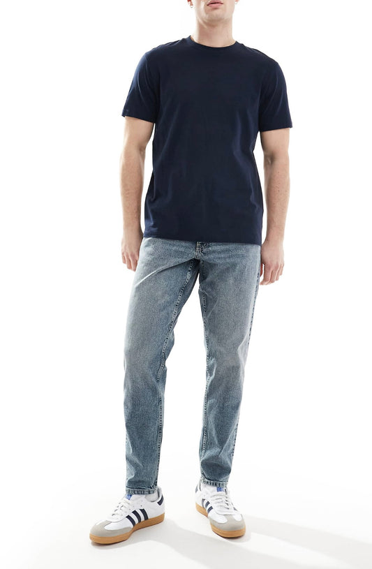 ASOS DESIGN tapered jeans in light wash blue