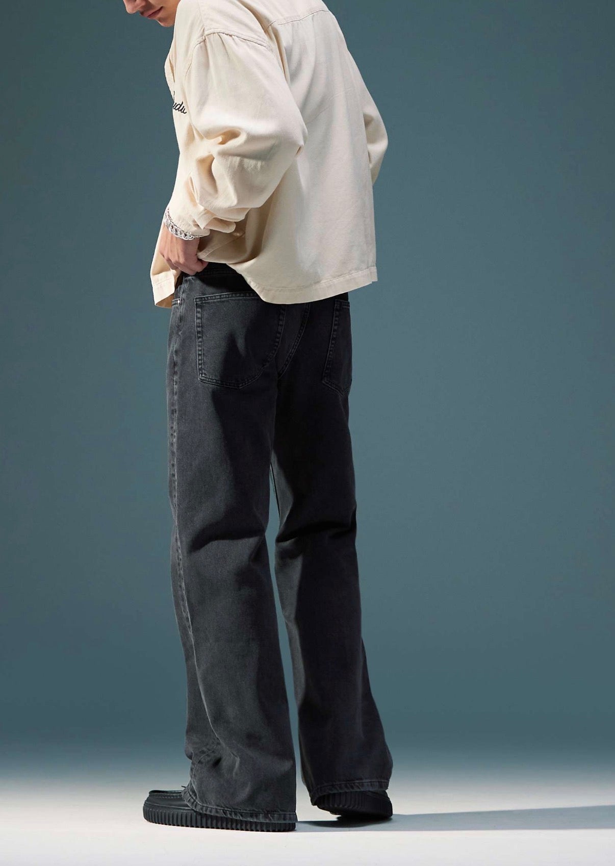 ASOS DESIGN wide flare jeans in washed black