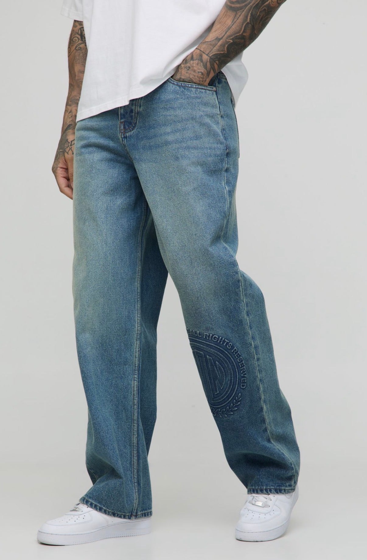 BoohooMAN Tall Relaxed Fit Embossed Jeans