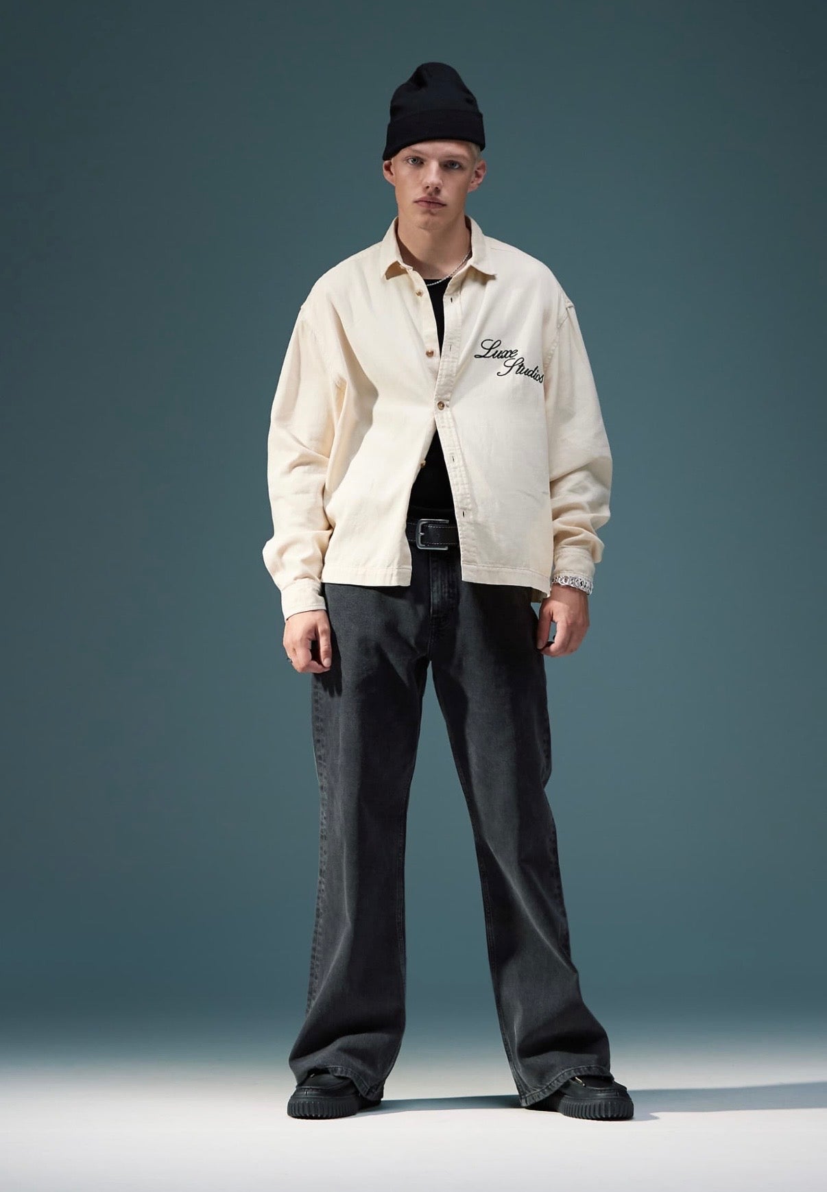 ASOS DESIGN wide flare jeans in washed black