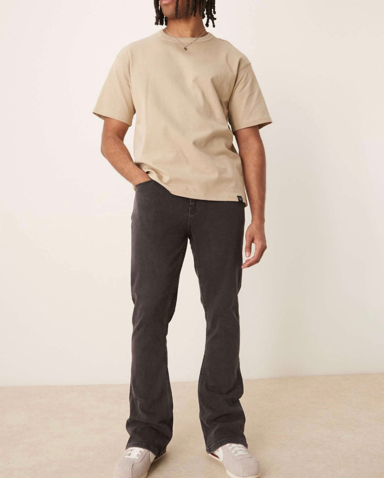 ASOS DESIGN stretch flared jeans in washed black