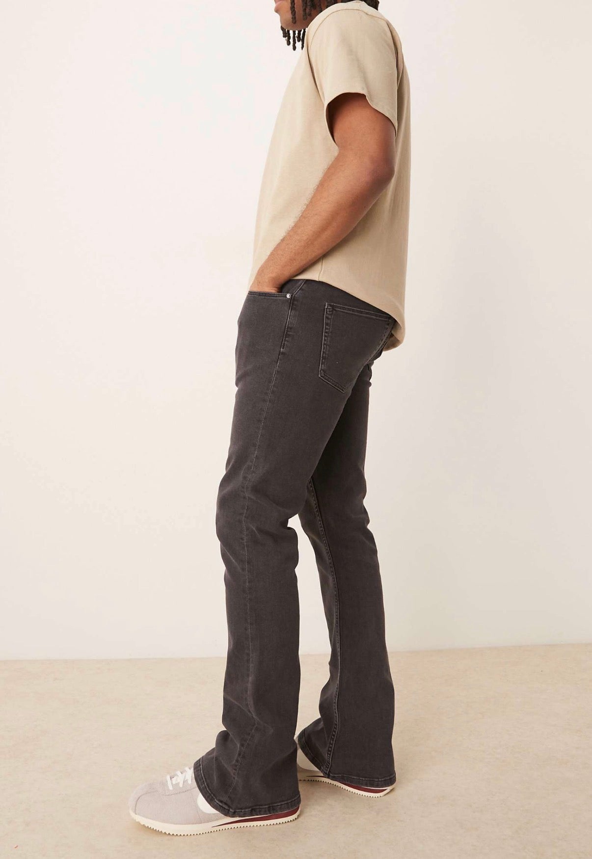 ASOS DESIGN stretch flared jeans in washed black