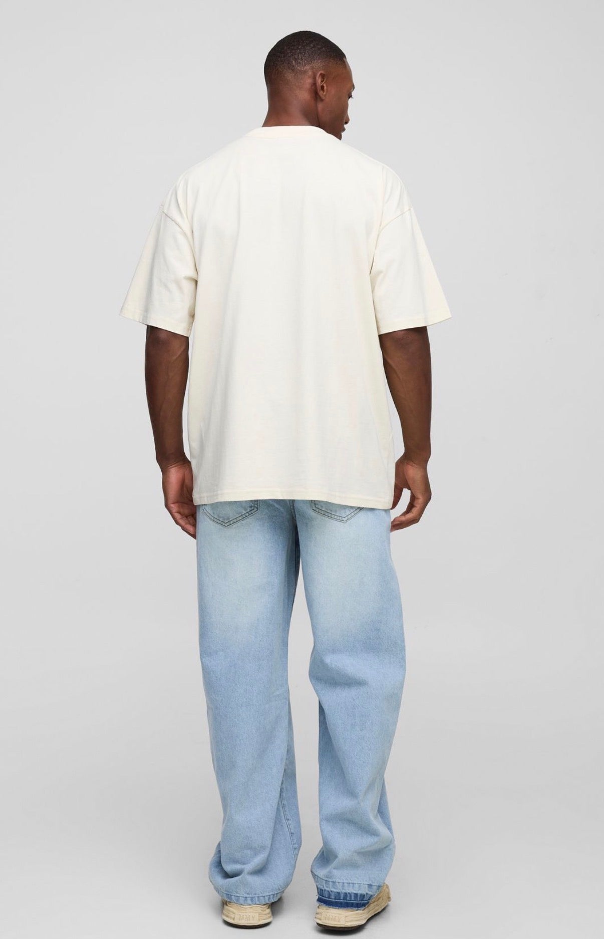 BoohooMAN Relaxed Floral Embroidery Denim Jeans With Let Down Hem