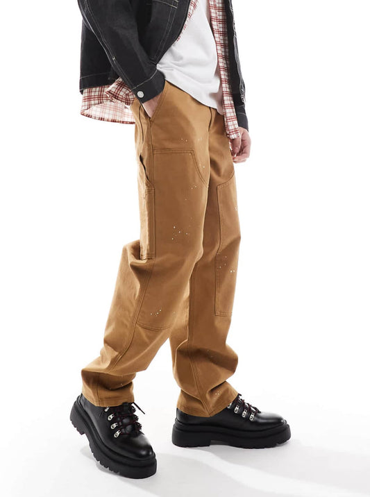 ASOS DESIGN carpenter trousers with paint splats in tan