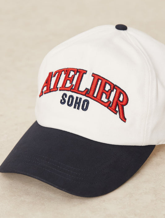ASOS DESIGN cap with embroidery and contrast peak in white
