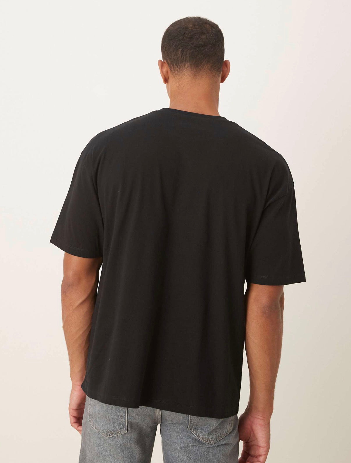 ASOS DESIGN oversized t-shirt with cartoon print in black