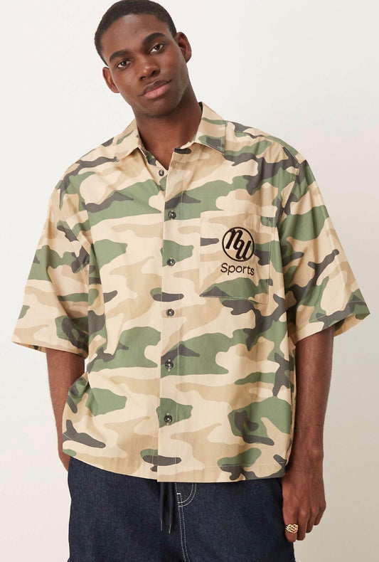 ASOS DESIGN boxy oversized shirt with chest embroidery in camo print