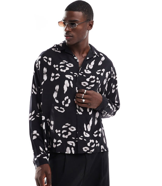 ASOS DESIGN oversized revere shirt with leopard print in black