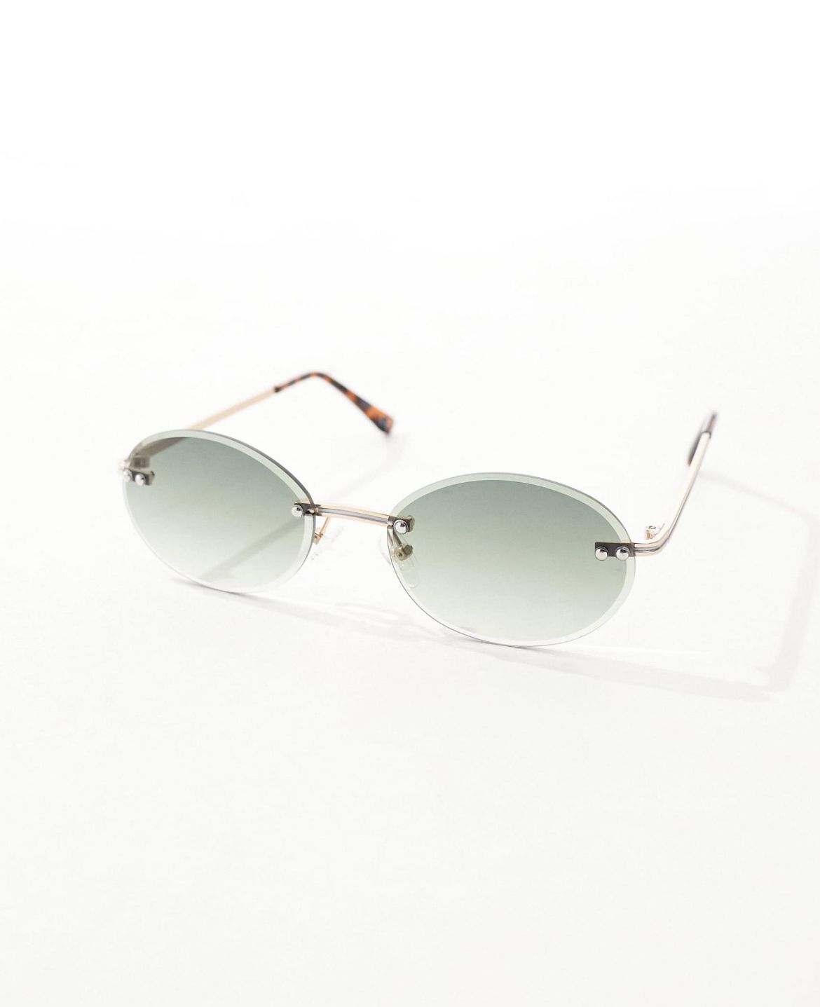 ASOS DESIGN rimless sunglasses with round lens in gold